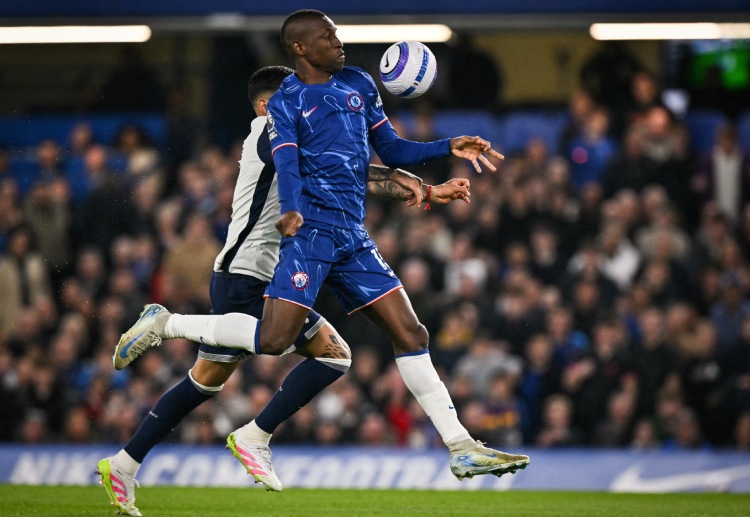 Nicolas Jackson battles for possession against Cristian Romero in a Premier League clash